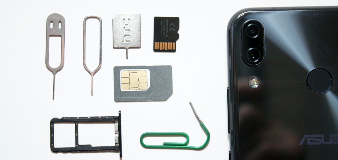 a cell phone with a sim card attached to it